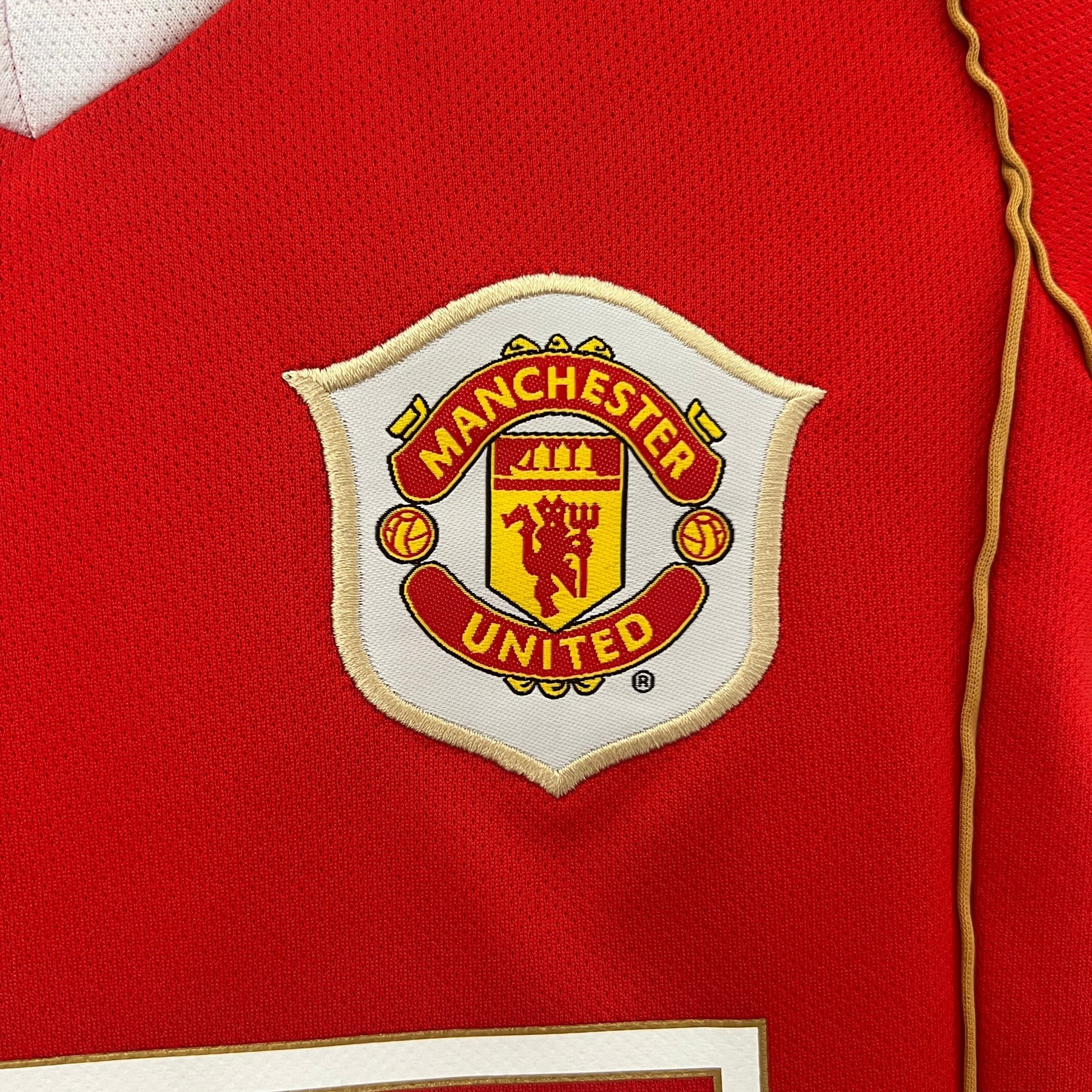 KIT INFANTIL RETRÔ MANCHESTER UNITED HOME 06/07
